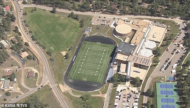 Jefferson County Sheriff's Office said a gunman opened fire at Evergreen High School (pictured from above), 28 miles southwest of Denver, just after noon local time