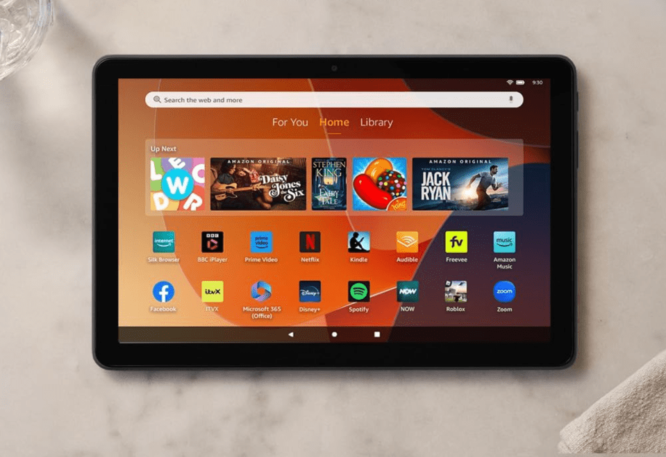 Amazon Fire 10 tablet displaying app icons and content recommendations.