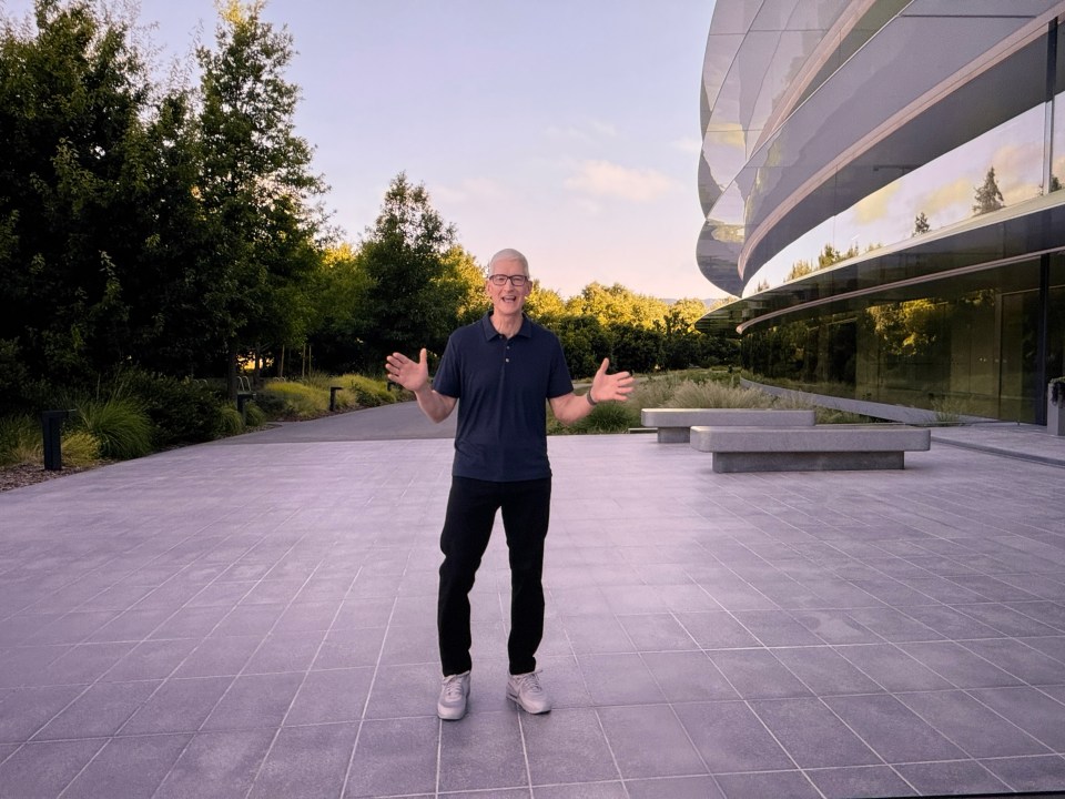 Tim Cook standing outside Apple Park.