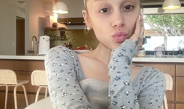 Ariana Grande made a rare political statement on Sunday to her captive, combined 523.2M social media following (pictured September 14)