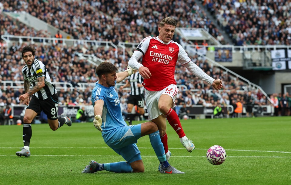Arsenal's Viktor Gyokeres falls to the ground after a challenge from Newcastle United's Nick Pope.