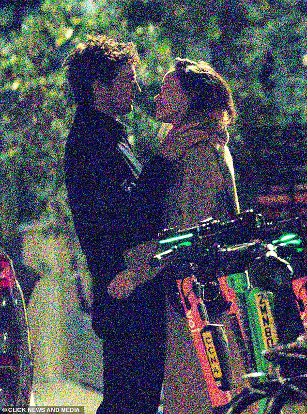 Ellie Goulding's ex, art dealer Caspar Jopling, was spotted sharing a passionate kiss with Olivia Wilde in Notting Hill, London