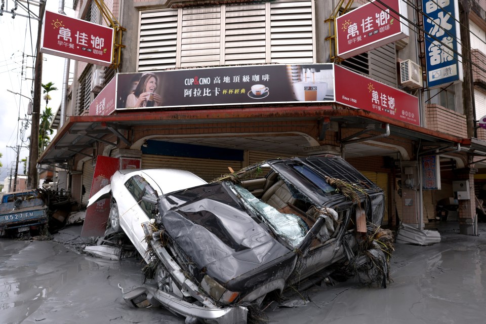 Damaged cars lie following flooding in Hualien, Taiwan.