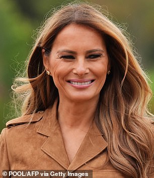 Burnished bronze, her mermaid curls tumbled beautifully over her shoulders during last week¿s state visit