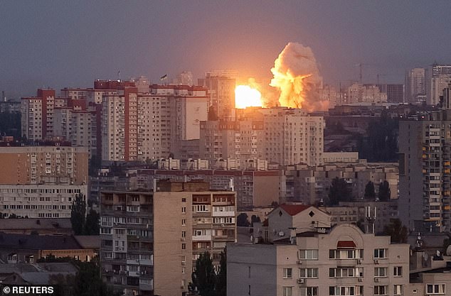An explosion of a missile in Kyiv, Ukraine, lights up the sky during a Russian strike -- September 7, 2025