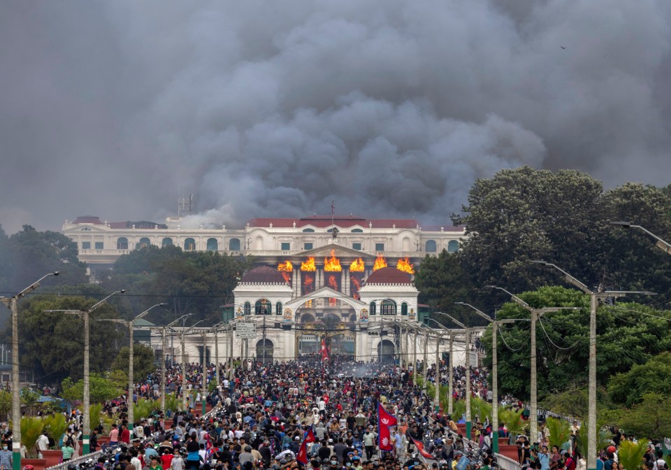 Singha Durbar palace burning during protests in Kathmandu, Nepal.