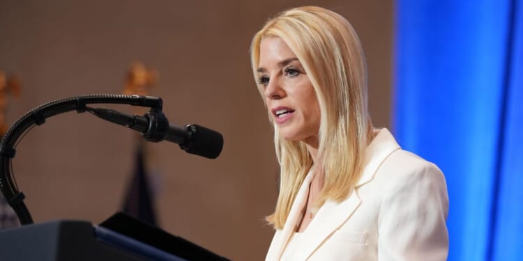 U.S. Attorney General Pam Bondi speaks at the Justice Department on March 14, 2025 in Washington, DC.