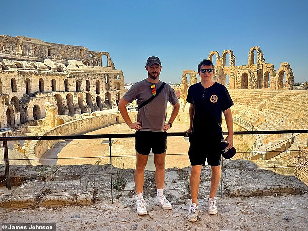 James (pictured with his friend in Tunis) claimed that he and other passengers were unaware of the near miss, believing a storm had prevented them from landing