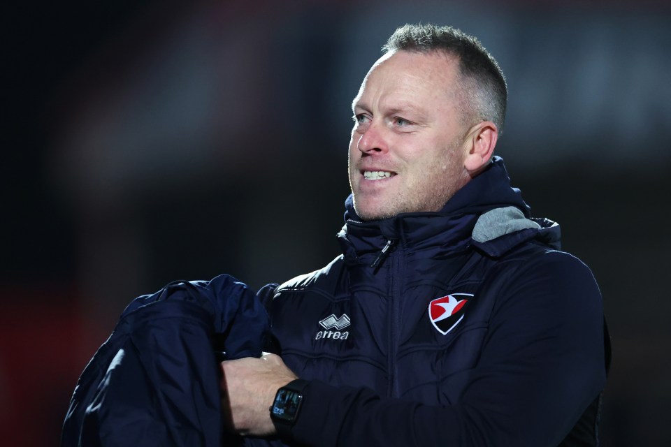 Michael Flynn, manager of Cheltenham Town, prior to a football match.