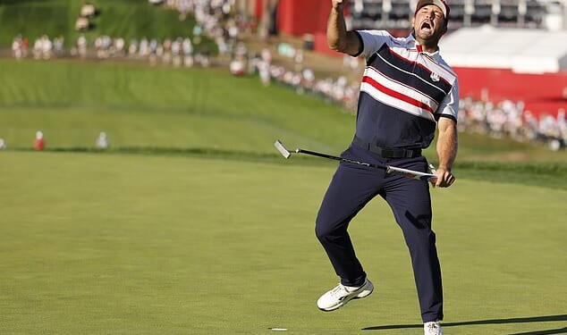 Bryson DeChambeau celebrates his half point against Europe's Matt Fitzpatrick on Sunday