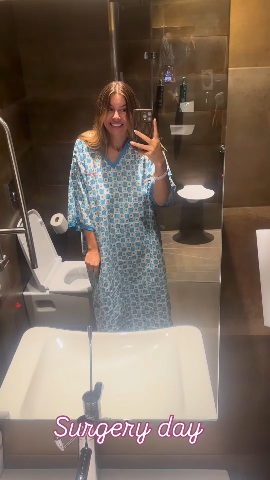 Woman in a hospital gown on her surgery day.