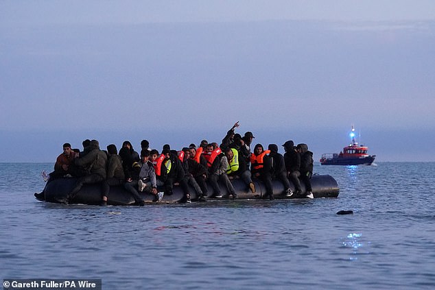A small boat carrying migrants near Gravelines in France this morning