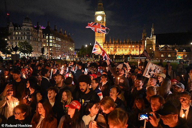 Charlie Kirk's UK campaign group paid tribute to the Conservative activist in front of the Palace of Westminster on Friday evening
