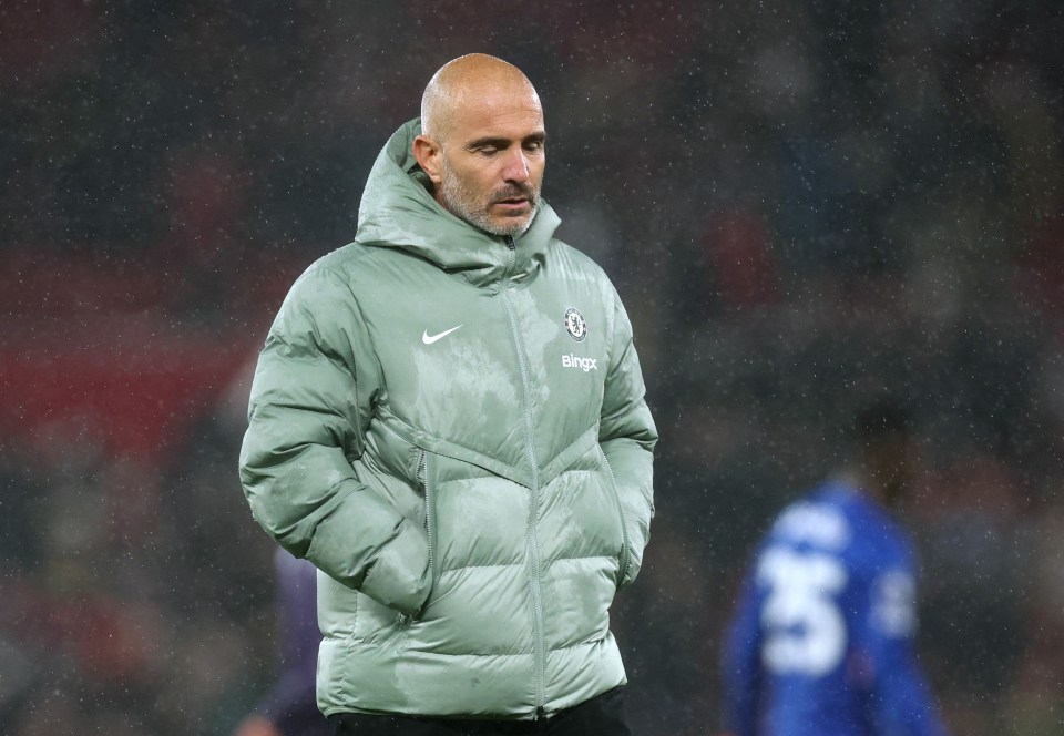 Chelsea manager Enzo Maresca looking dejected after a soccer match.