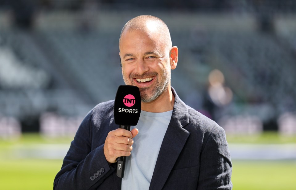 Joe Cole holding a TNT Sports microphone.