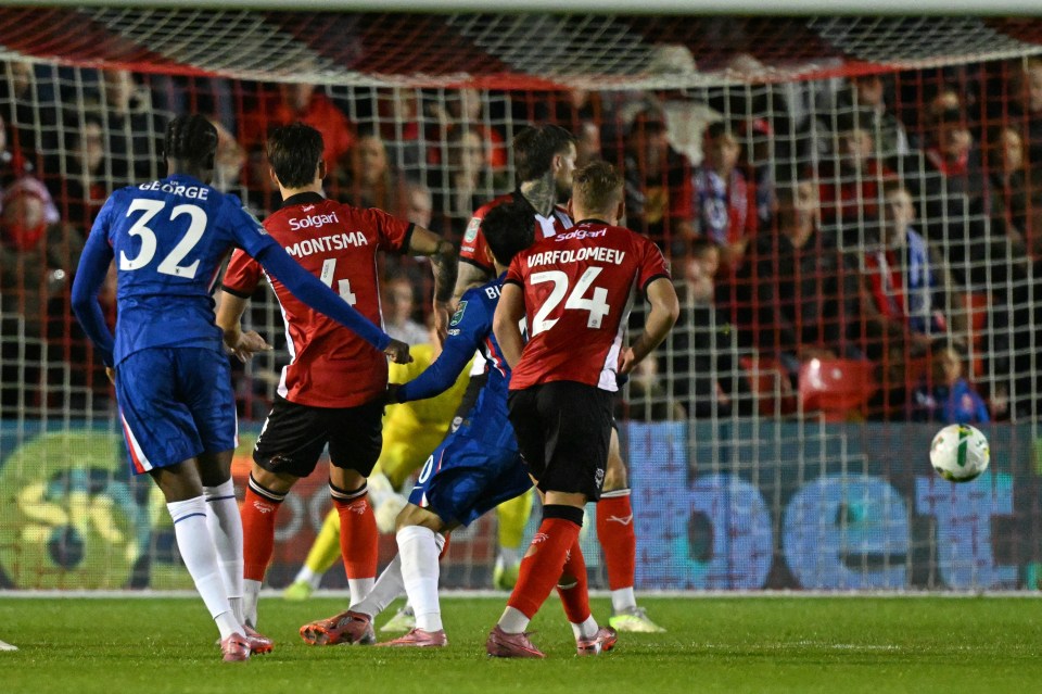Chelsea's English midfielder Tyrique George (L) watches his shot make it 1-1.