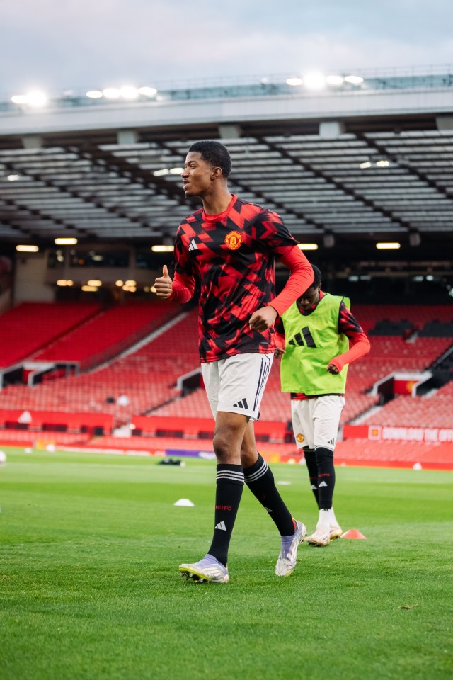 Chido Obi-Martin warming up for Manchester United.