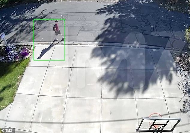 Video obtained by TMZ shows a figure believed to be Tyler Robinson walking towards Utah Valley University around 8am last Wednesday, about four hours before Kirk was shot. The suspect was seen wearing a maroon shirt, black baseball cap, light shorts and sneakers - the same outfit that police claim Robinson wore the morning of the shooting