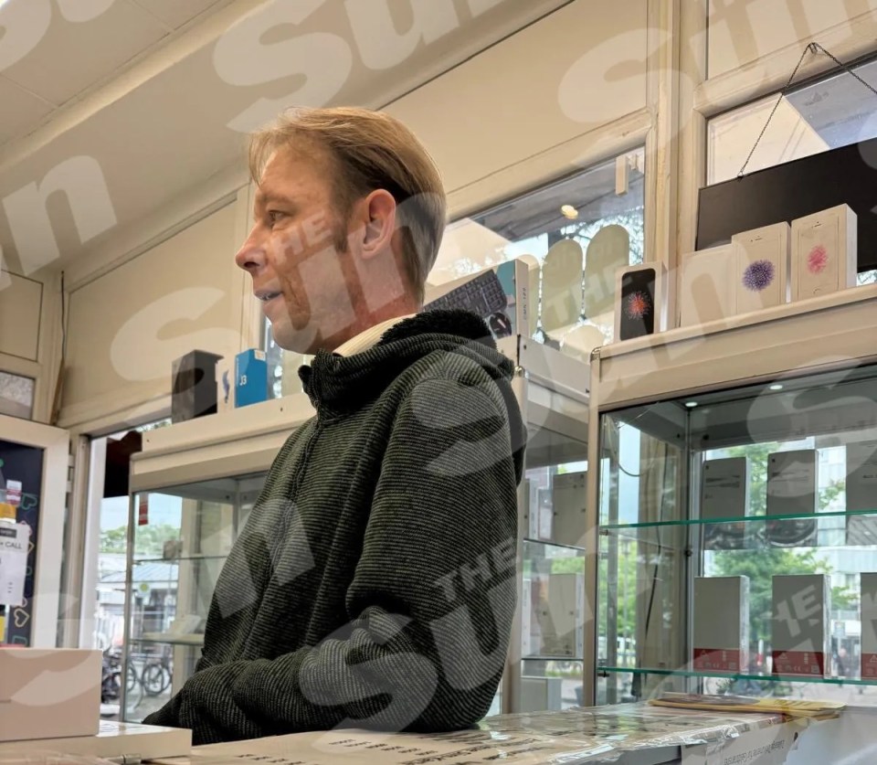 Christian Bruckner in a mobile phone shop in Neumunster, Germany, buying a mobile phone.