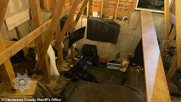 Police discovered the makeshift residence - which included a bed, a television, lights chargers and other electronics hooked up to the building - at a condominium complex in suburban Portland