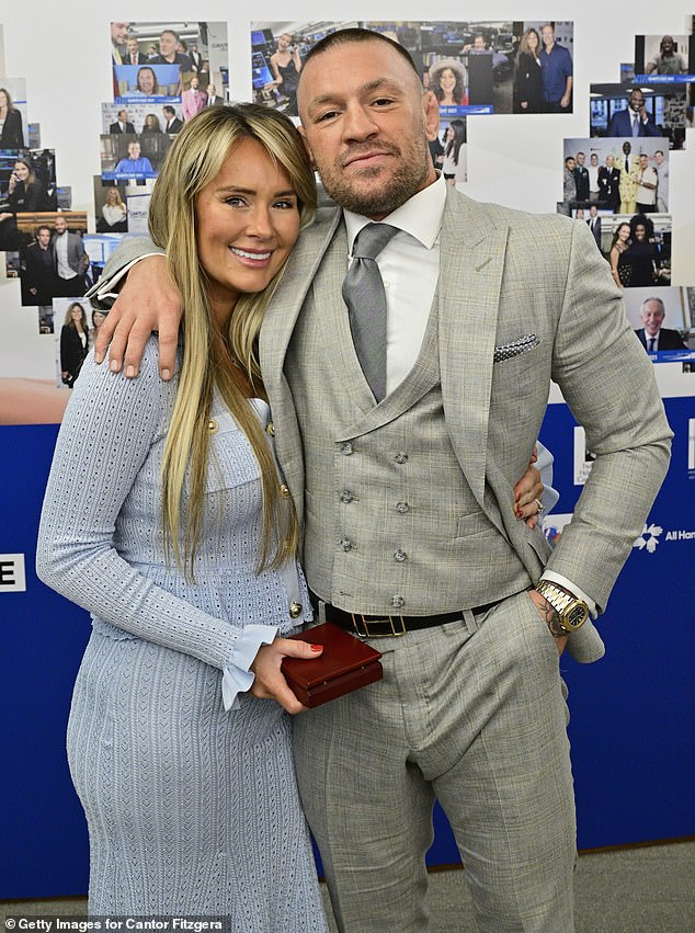 Pictured: Dee Devlin and Conor McGregor attend Charity Day 2025 Hosted by the Cantor Fitzgerald Relief Fund at Cantor on September 11, 2025 in New York City