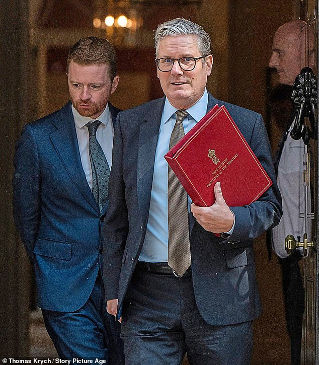 Prime Minister Keir Starmer leaves No 10 with his chief of staff, Morgan McSweeney