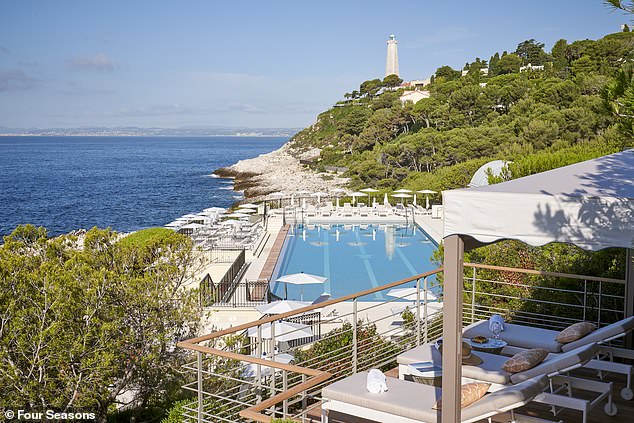 The hotel's Club Dauphin features a 33 metres-long sea-water heated infinity pool surrounded by panoramic sea views