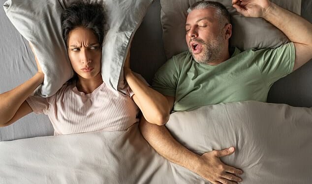 Half of Britons say they regularly survive on four hours sleep or less and it's causing trouble at work and strain in relationships with some couples admitting to sleeping separately (Stock image)