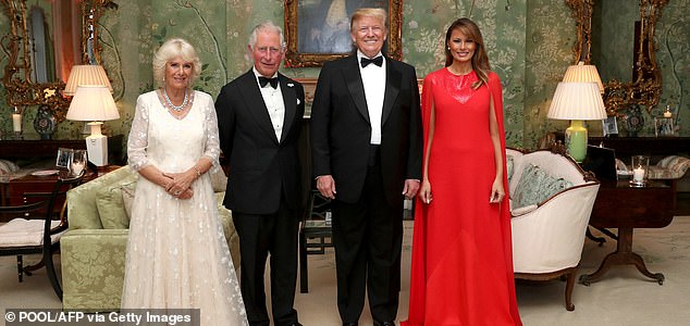 US President Donald Trump (2R), US First Lady Melania Trump (R), Britain's Prince Charles, Prince of Wales (2L), and his wife Britain's Camilla, Duchess of Cornwall, pose for a photograph ahead of a dinner at Winfield House, the residence of the US Ambassador, where US President Trump is staying whilst in London, on June 4, 2019, on the second day of the US President's three-day State Visit to the UK. US President Donald Trump turns from pomp and ceremony to politics and business on Tuesday as he meets Prime Minister Theresa May on the second day of a state visit expected to be accompanied by mass protests. (Photo by Chris Jackson / POOL / AFP) (Photo by CHRIS JACKSON/POOL/AFP via Getty Images)