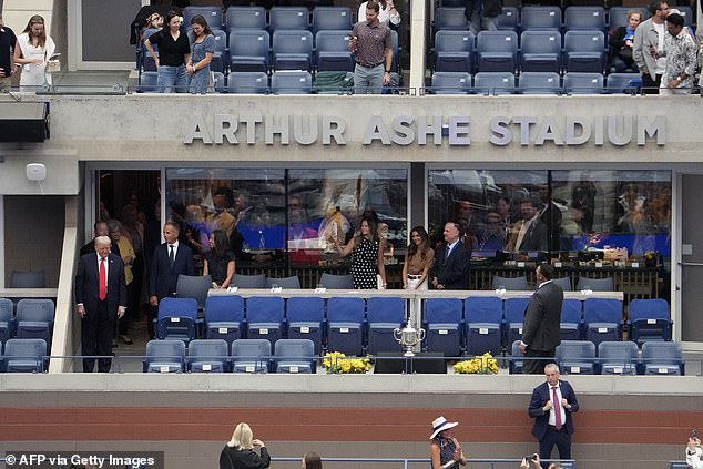 Trump is a guest of Rolex at Arthur Ashe Stadium, where Jannik Sinner faces Carlos Alcaraz