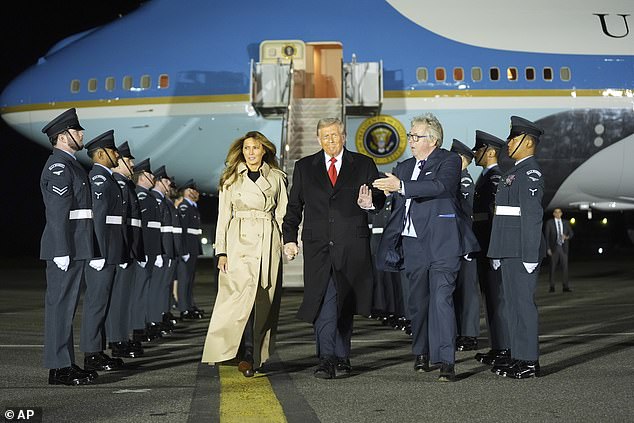Donald Trump and First Lady Melania Trump are greeted by The Viscount Hood at Stansted Airport