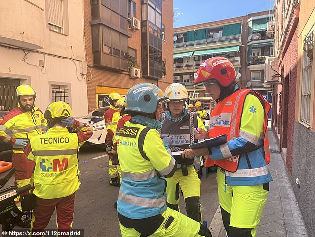 Doors had been ripped off their hinges, with shards of glass scattered on the road outside, while first responders whisked away a victim on a stretcher