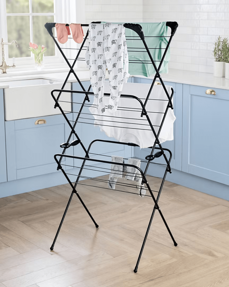 Black three-tier drying rack with laundry.