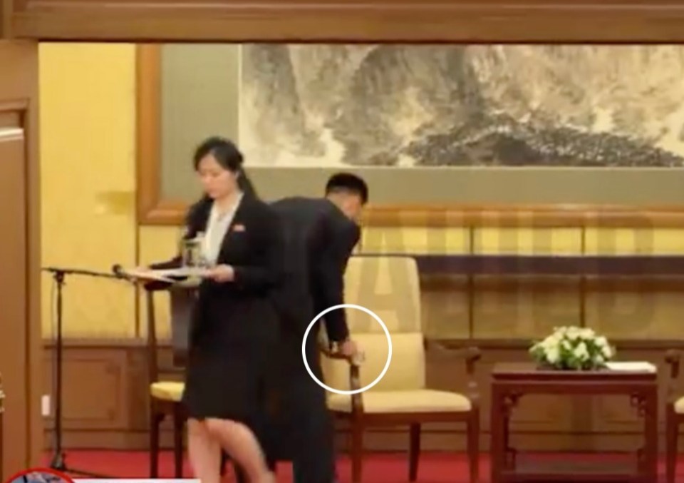 Kim Jong Un's aides cleaning after a meeting with Vladimir Putin.
