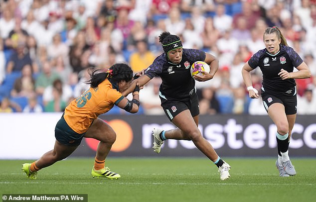 England set up a World Cup quarter-final with Scotland by scoring seven tries against Australia