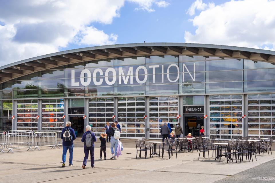 People entering the Main Hall of the Locomotion Railway Museum in Shildon, England.