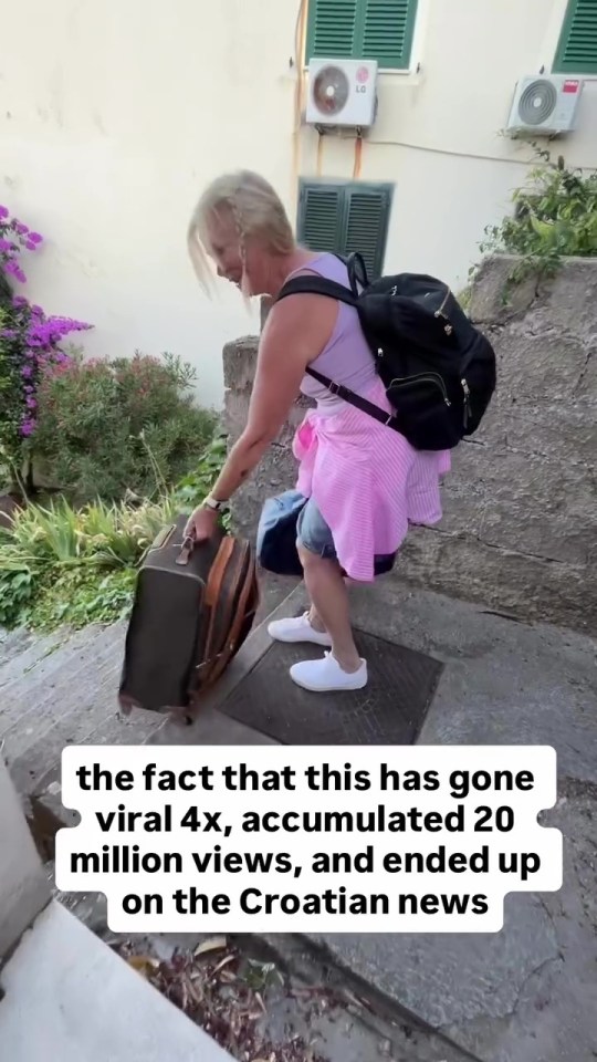 The video showing the woman kicking her luggage down the old steps has gone viral