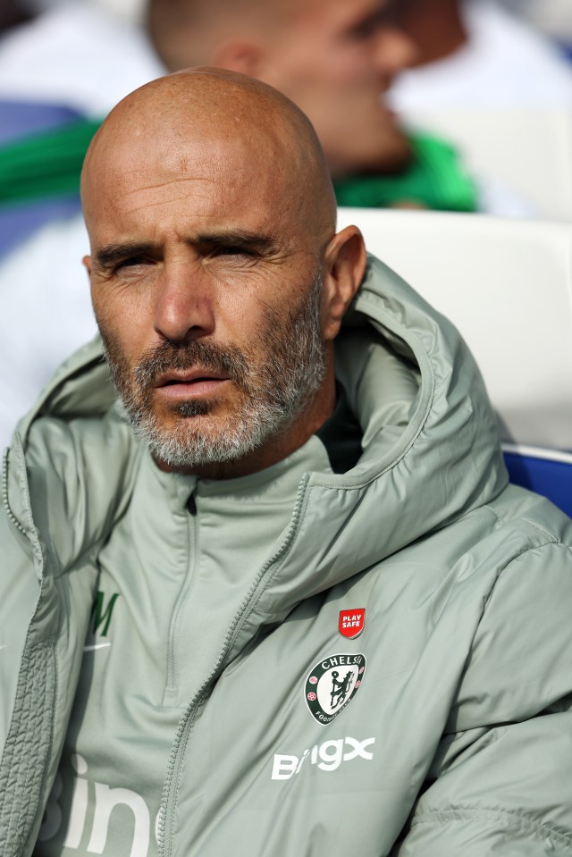 Enzo Maresca, Manager of Chelsea, looks on.