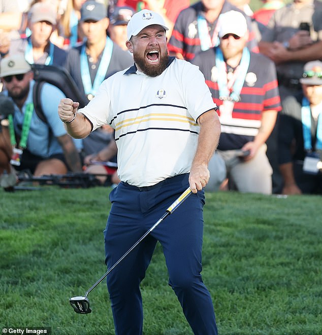 Shane Lowry showed nerves of steel to get Europe the half point needed to retain the trophy