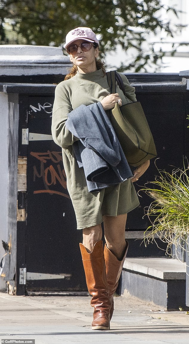 The actress, 51, who has kept a low profile over the last year, shielded her face with a baseball cap while picking up some shopping