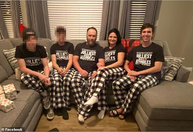 The Robinson family are seen celebrating Christmas in matching pajamas