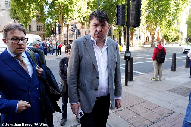Graham Linehan arrives at Westminster Magistrates' Court in London for the second day of his trial over alleged harassment of a trans woman