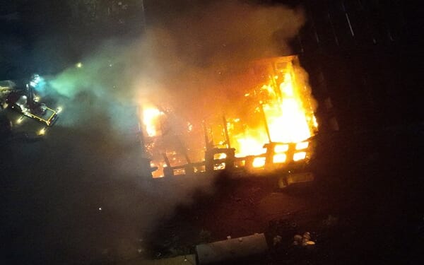 Firefighter seriously injured tackling major blaze at derelict mill as building collapses