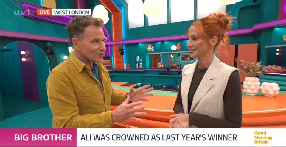 Two people discuss Ali, last year's "Big Brother" winner, live on ITV1 in West London.