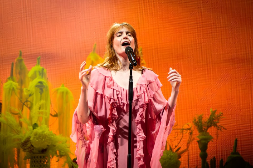 Florence Welch of Florence and the Machine performing at a festival.