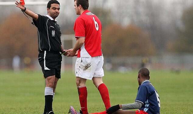 Footballers have been ordered not to say the phrases 'come on lads' or 'linesman' as they could be deemed offensive (Stock Photo)