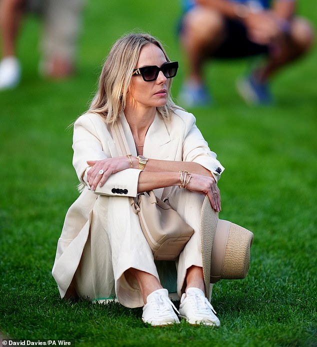 McIlroy's wife, Erica Stoll, was seen watching on at Bethpage Black on Saturday