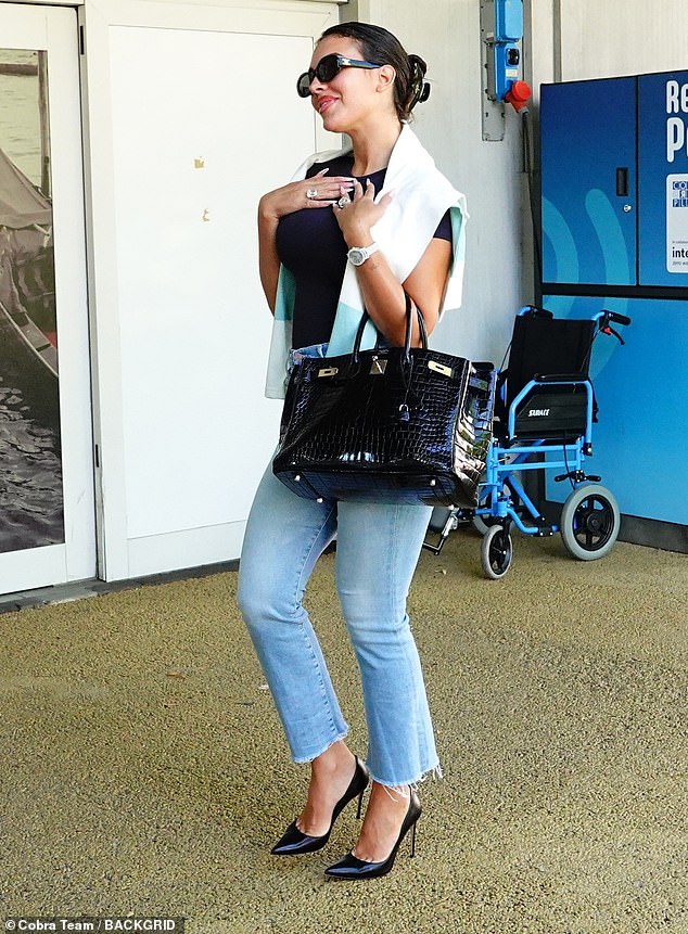 She continued to showcase her ring collection while leaving