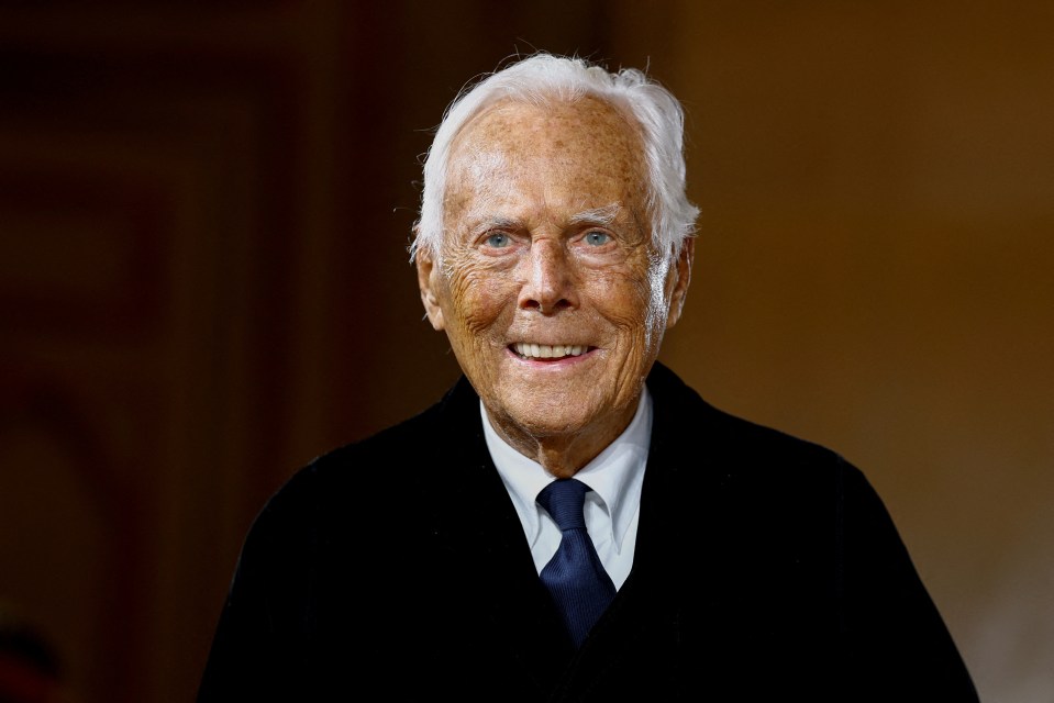 Giorgio Armani at a fashion show.