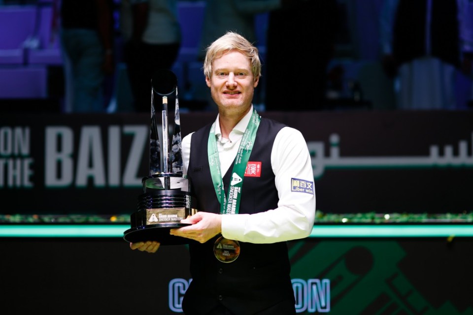 JEDDAH, SAUDI ARABIA - AUGUST 16: Neil Robertson of Australia poses with champion trophy after winning the Final match against Ronnie O'Sullivan of England on day 9 of the Saudi Arabia Masters 2025 at Green Halls on August 16, 2025 in Jeddah, Saudi Arabia. (Photo by Tai Chengzhe/VCG via Getty Images)